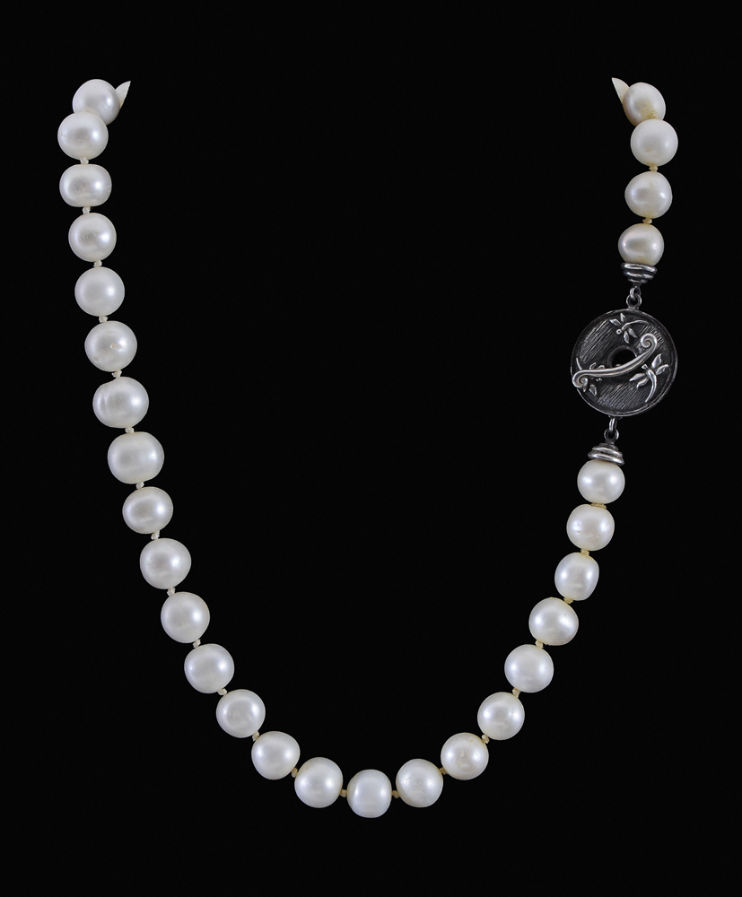 Appraisal: Freshwater Cultured Pearl Endless Necklace off-round creamy white pearls mm