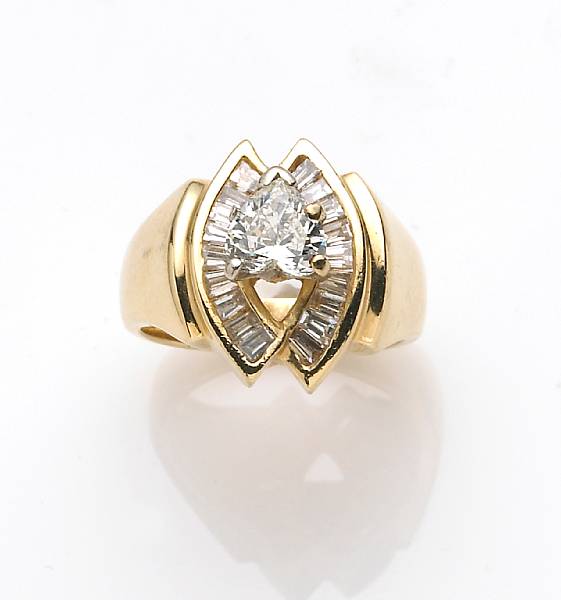 Appraisal: A diamond and k gold ring center diamond weighing an