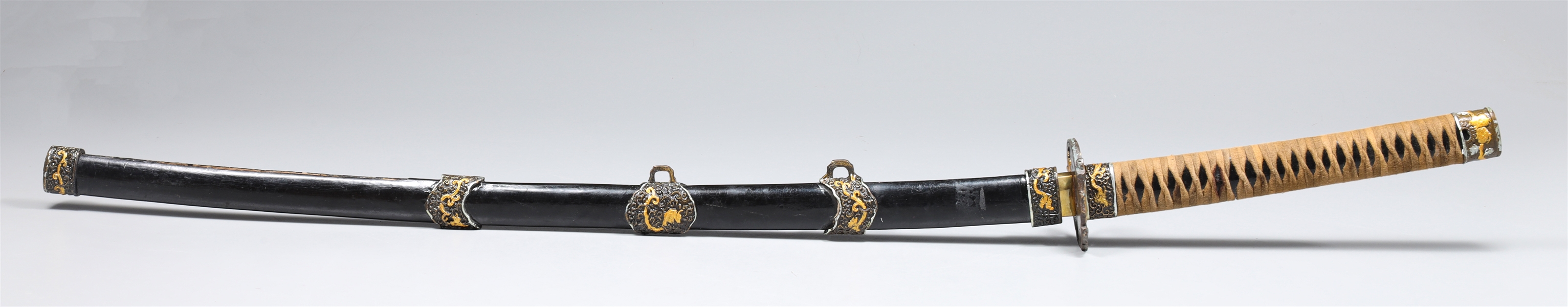 Appraisal: Japanese style sheathed Katana with gilt broze tsuba and fittings