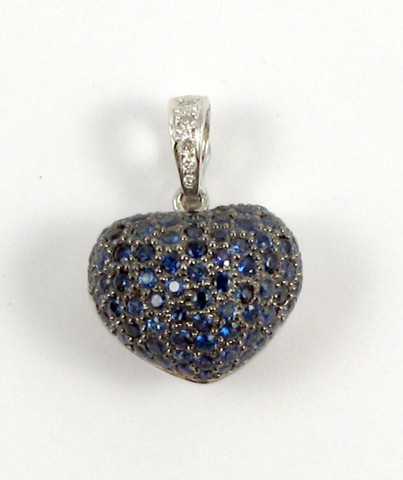 Appraisal: SAPPHIRE AND DIAMOND PENDANT The k white gold heart pendant