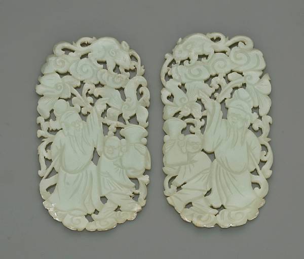 Appraisal: A pair of greenish-white jade plaques Late Qing Dynasty Each