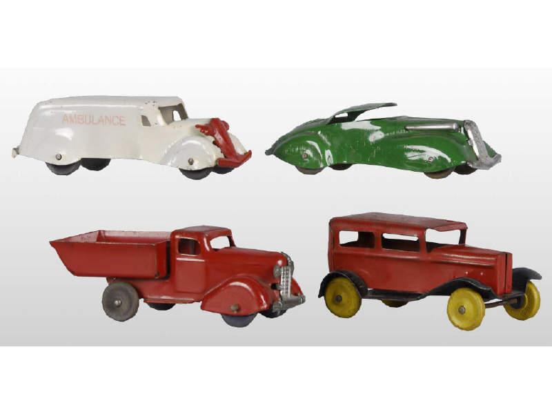 Appraisal: Lot of Pressed Steel Toy Cars Trucks Description Wyandotte sedan