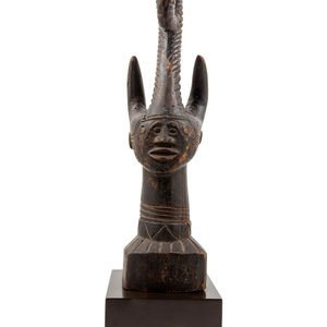 Appraisal: An Igbo Style Carved Wood Sculpture Mid- th Century Height