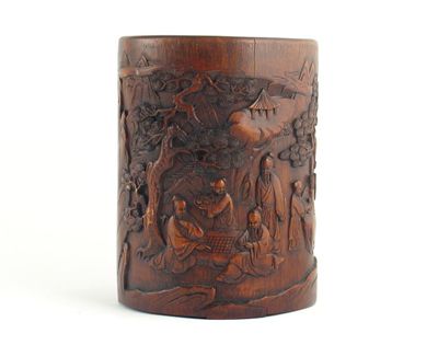 Appraisal: A Chinese bamboo brushpot carved with figures playing go beneath