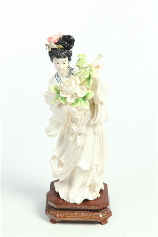 Appraisal: CARVED IVORY FIGURE OF A WOMAN China early th century