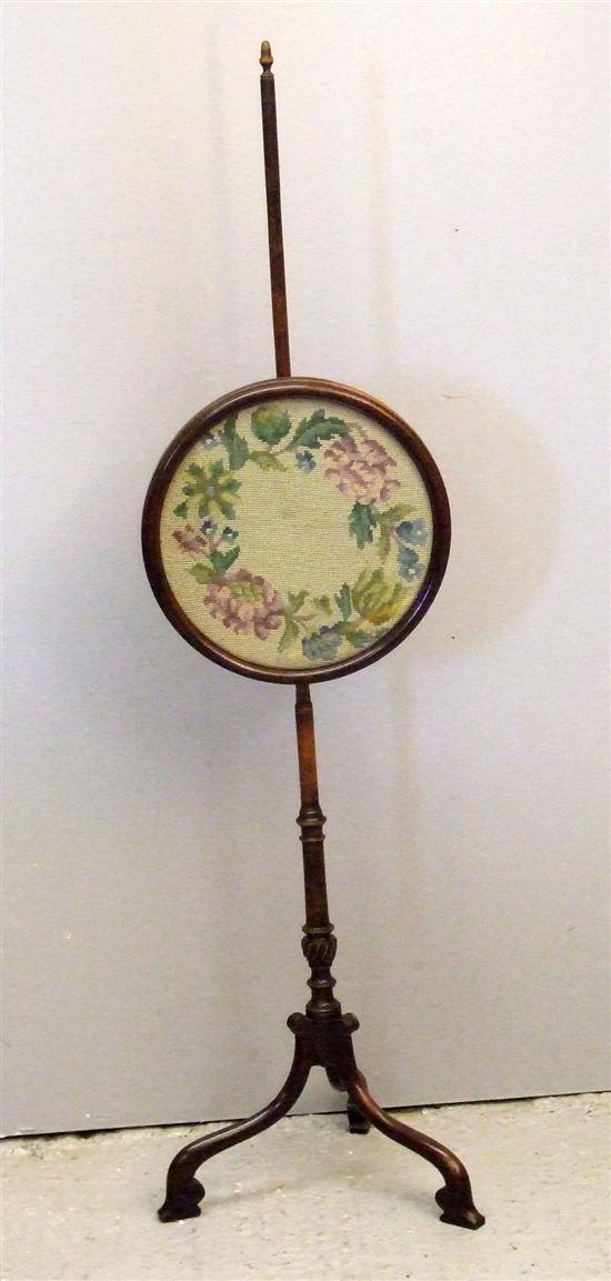 Appraisal: Victorian mahogany adjustable pole screen with circular floral woolwork screen