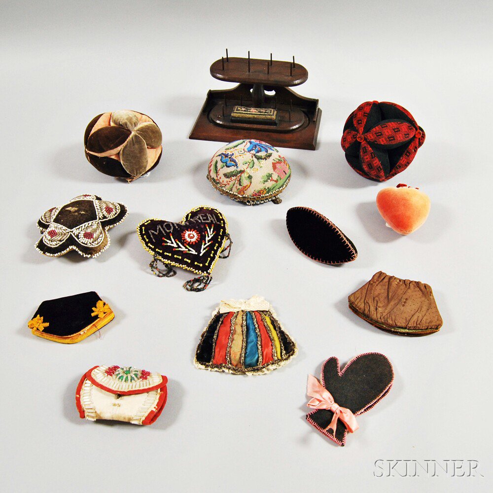 Appraisal: Group of Mostly Pincushions including a floral beaded a heart-form