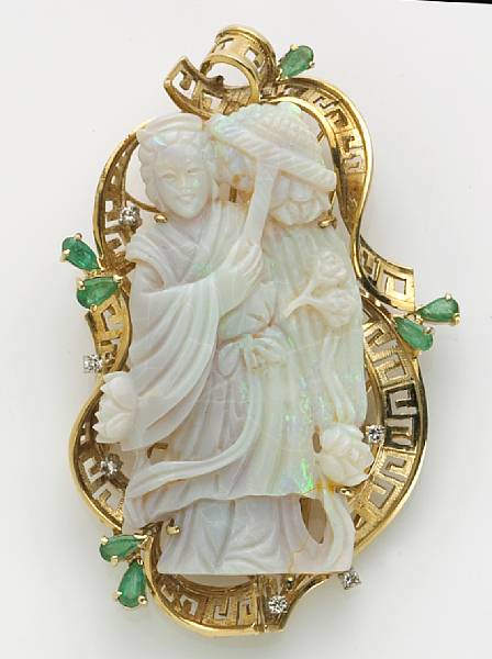 Appraisal: A carved opal emerald and diamond brooch-pendant mounted in eighteen