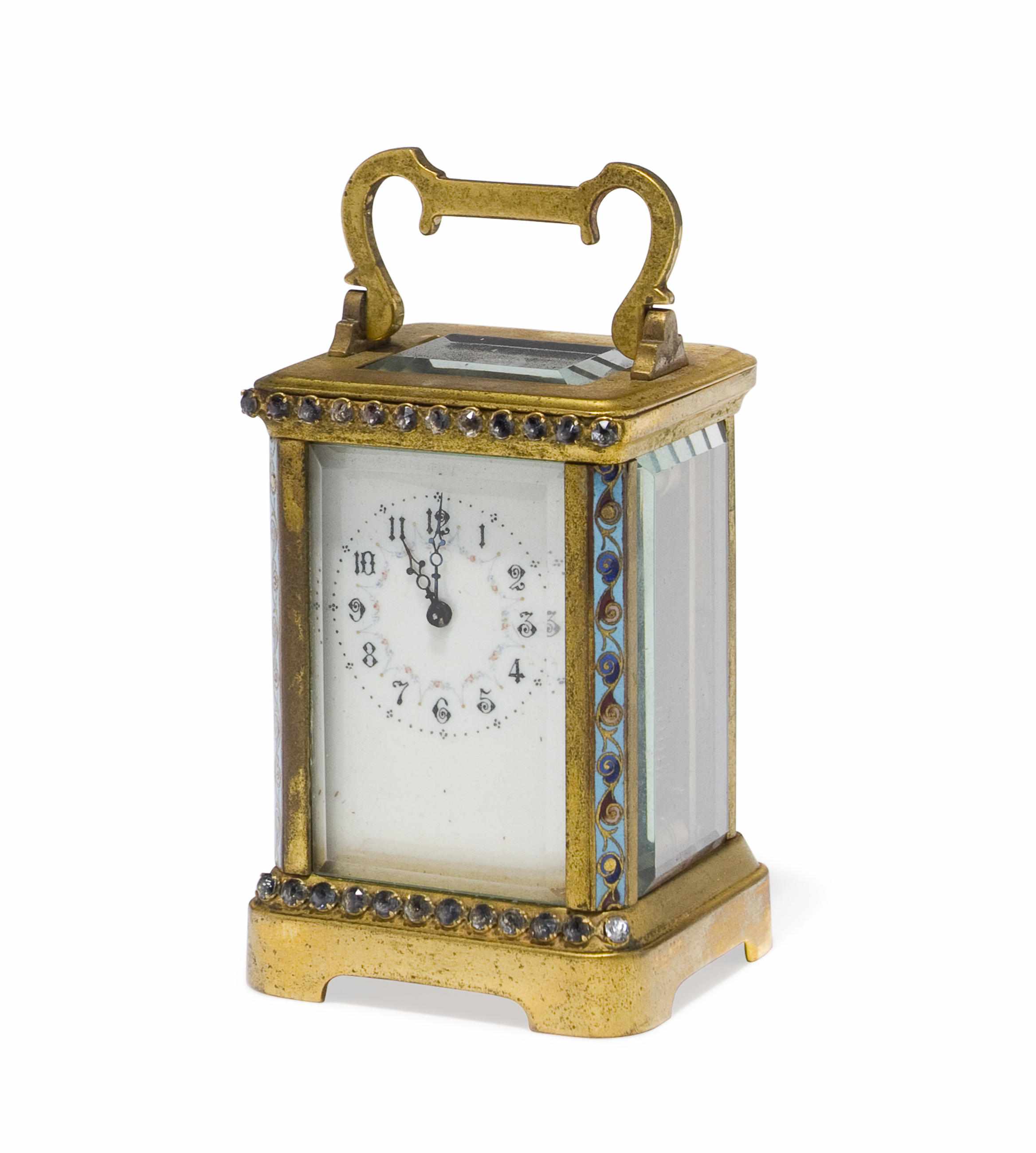 Appraisal: A French brass miniature carriage clock late th centurymounted with