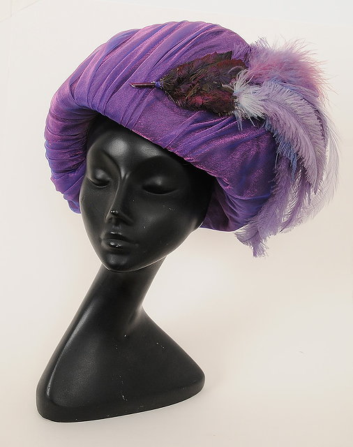 Appraisal: A theatrical purple crystal chiffon covered s style hat with