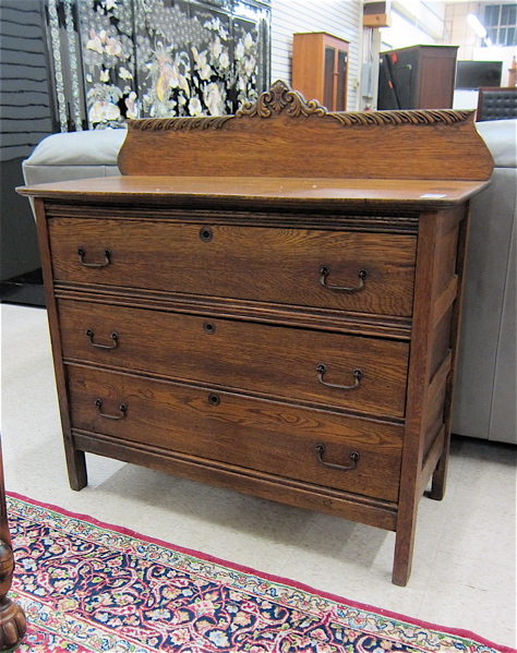 Appraisal: THREE-DRAWER OAK DRESSER American c Dimensions H x W x