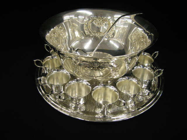 Appraisal: Silverplate Punchbowl Tray Cups excellent tray is diameter bowl is