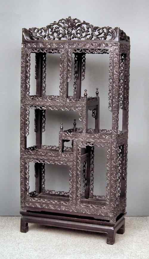 Appraisal: An early th Century Chinese blackwood display stand the whole