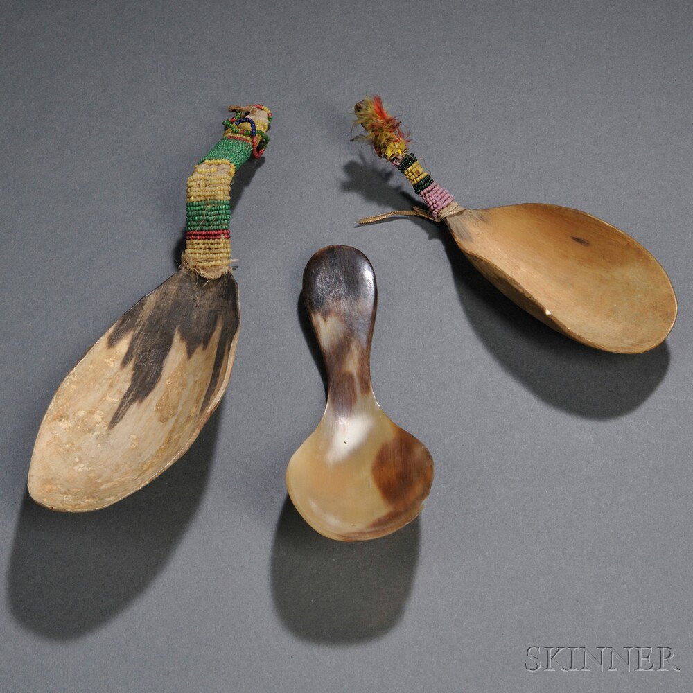 Appraisal: Three Plains Horn Spoons two with bead-wrapped handles damage lg