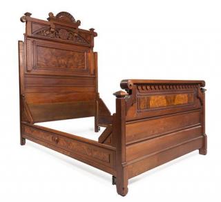 Appraisal: A Victorian Walnut Bed Height of headboard inches A Victorian