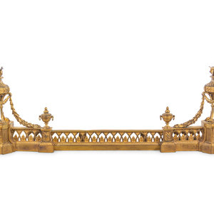 Appraisal: A Louis XVI Style Gilt Bronze Fire Fender with Flaming