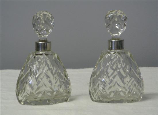 Appraisal: Pair of th century cut glass perfume bottles with silver