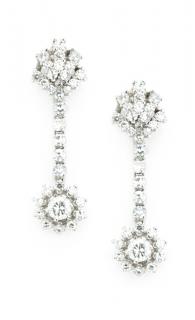 Appraisal: A PAIR OF DANGLE STYLE DIAMOND EARRINGS A PAIR OF