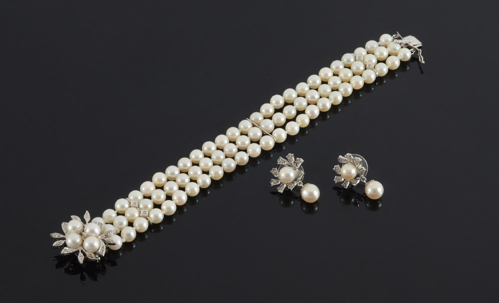 Appraisal: TRIPLE STRAND PEARL DIAMOND BRACELET EARRINGS K white gold clasp