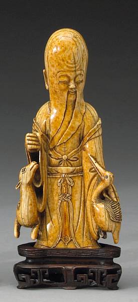 Appraisal: An ivory study of Shoulao th Century The bearded immortal