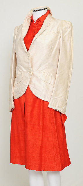 Appraisal: A cream silk linen jacket with bright orange silk red