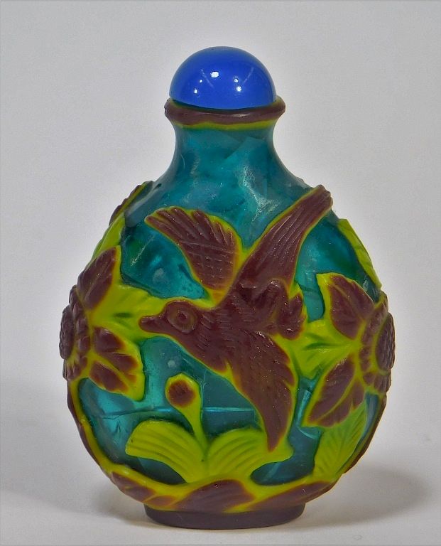 Appraisal: Chinese Carved Peking Glass Birds Snuff Bottle China th Century