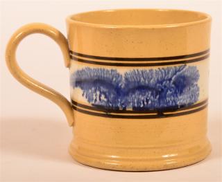 Appraisal: Yellowware Mug with Blue Mocha Seaweed Yellowware Mug with Blue