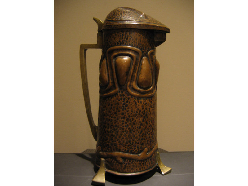 Appraisal: AUSTRIAN ARTS CRAFTS COPPER TANKARD the slightly tapered cylindrical body