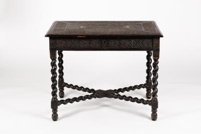 Appraisal: A th Century Indian ebonised table with blind fret carved