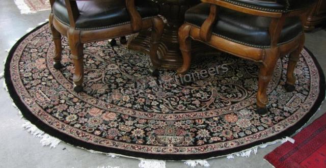 Appraisal: A handmade Oriental area rug traditional floral design with black