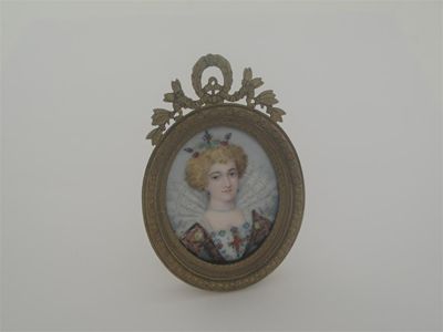 Appraisal: An enamelled portrait miniature in a brass frame enamelled on