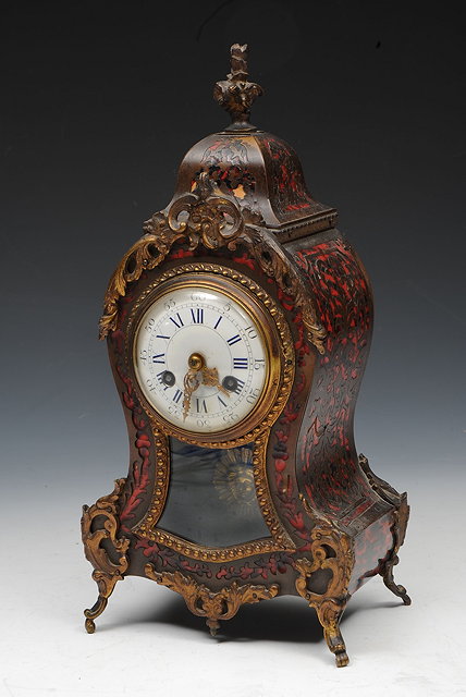 Appraisal: A FRENCH BOULLE MANTEL CLOCK with white enamelled dial and