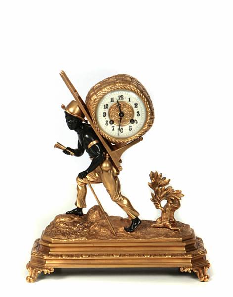 Appraisal: An Empire style gilt bronze clock with a blackamoor height