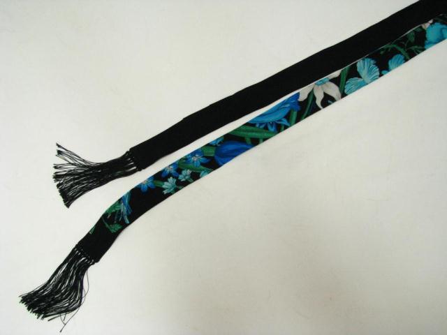 Appraisal: Gucci thin black floral design fringed scarf headband sash ''