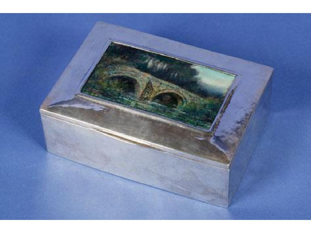 Appraisal: AN ARTS AND CRAFTS BOX of rectangular form the hinged