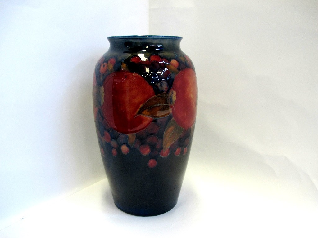 Appraisal: Moorcroft pomegranate vase impressed and signed to base tiny chip