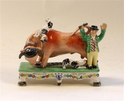 Appraisal: Staffordshire figural Bull-beating A figural group inscribed 'Bull Baiting' and