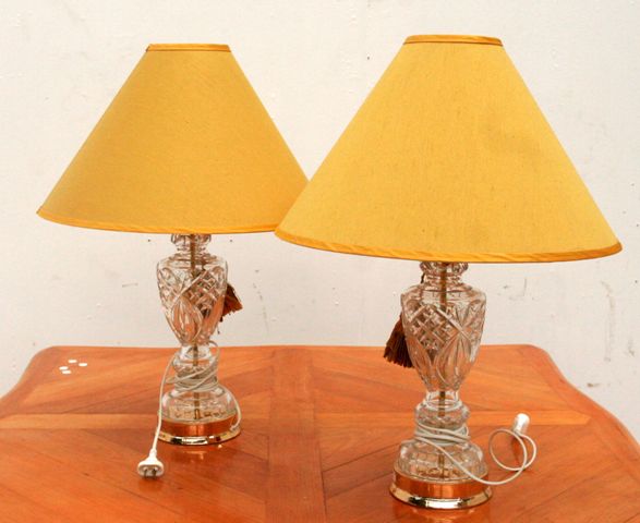 Appraisal: A pair of contemporary cut glass lamps cms high