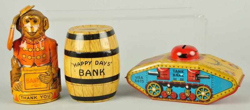 Appraisal: Lot of Tin Vending Banks Description Includes barrel monkey and