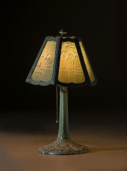 Appraisal: MILLER LITHOPHANE BOUDOIR LAMP American ca - with six molded