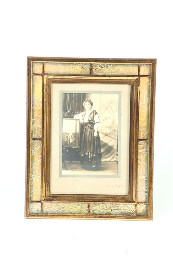 Appraisal: TIFFANY PICTURE FRAME American early th century Panels of iridescent