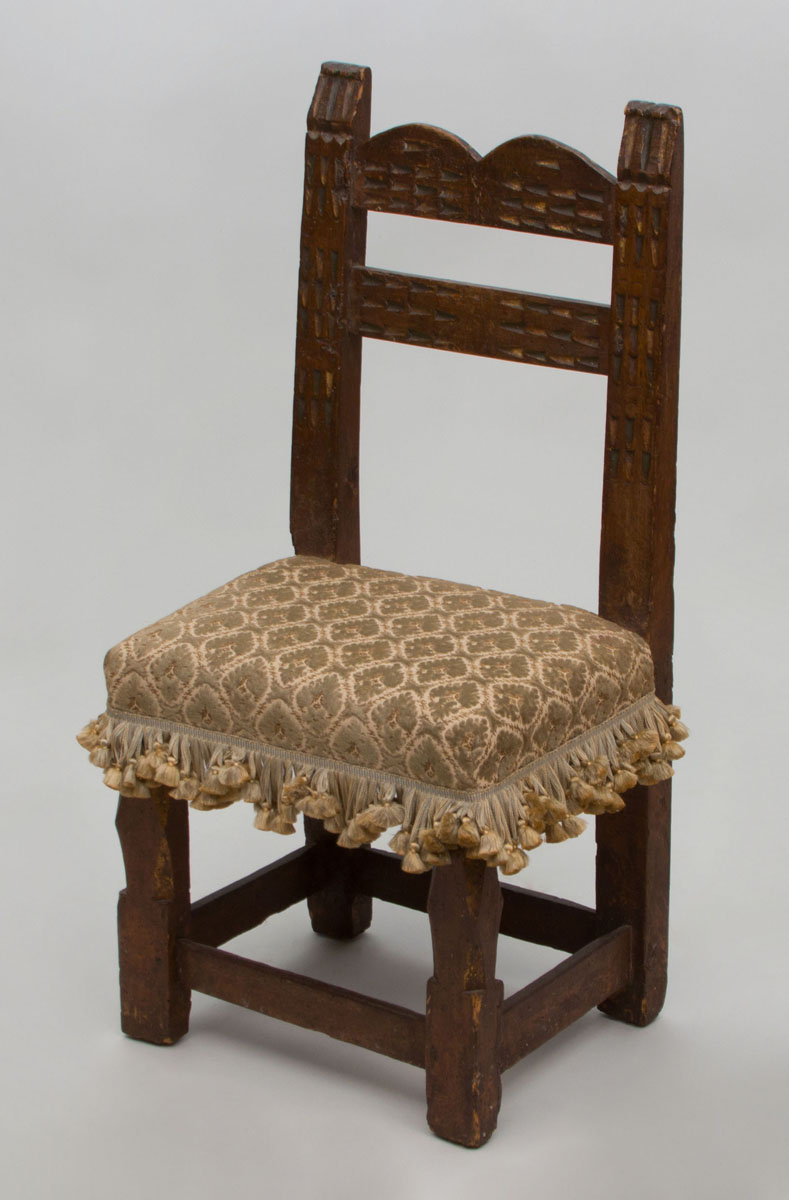 Appraisal: SPANISH BAROQUE CARVED WALNUT AND PARCEL-GILT CHILD'S CHAIR x x