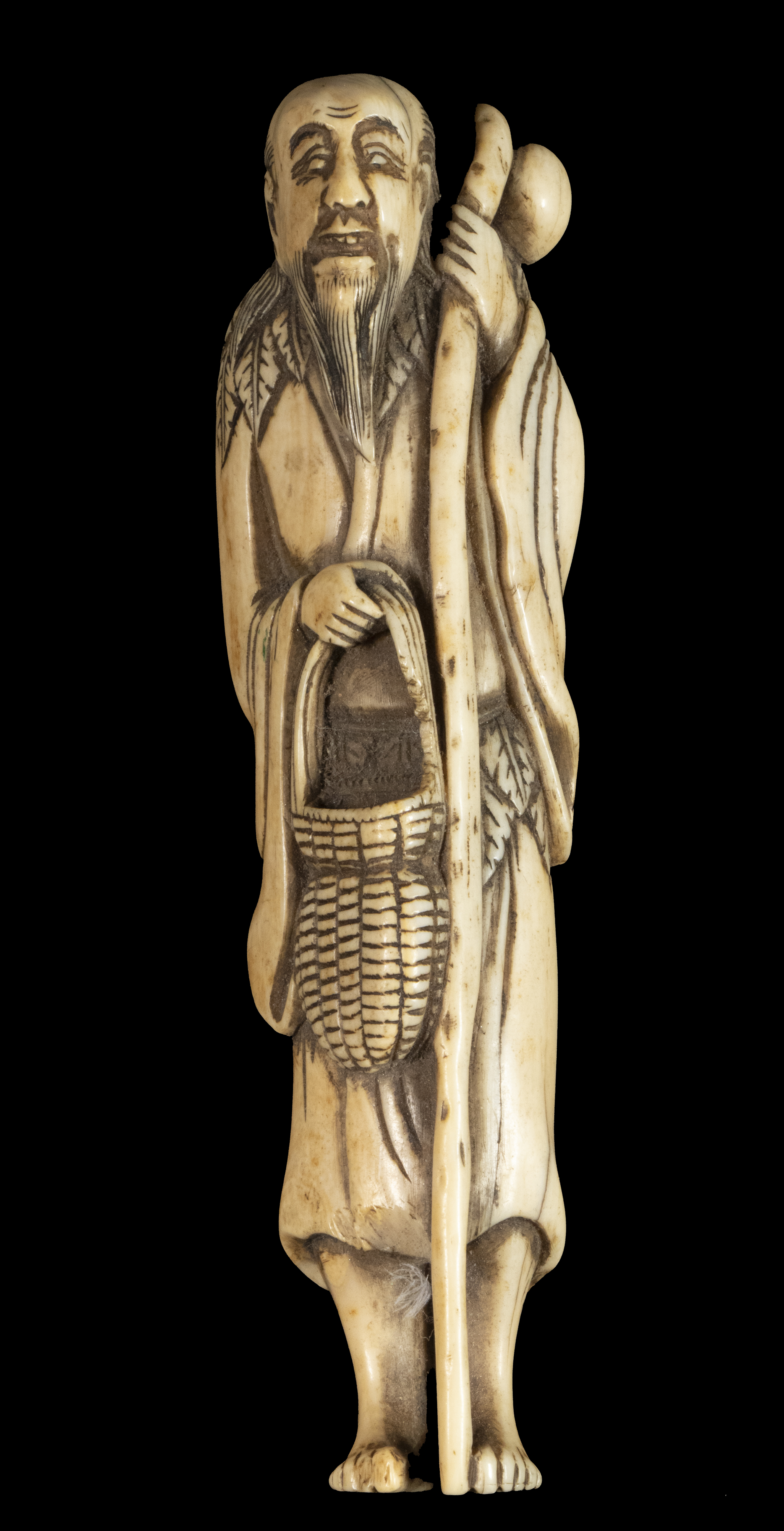 Appraisal: OVERSIZED TH C JAPANESE IVORY NETSUKE Sashi Netsuke of a