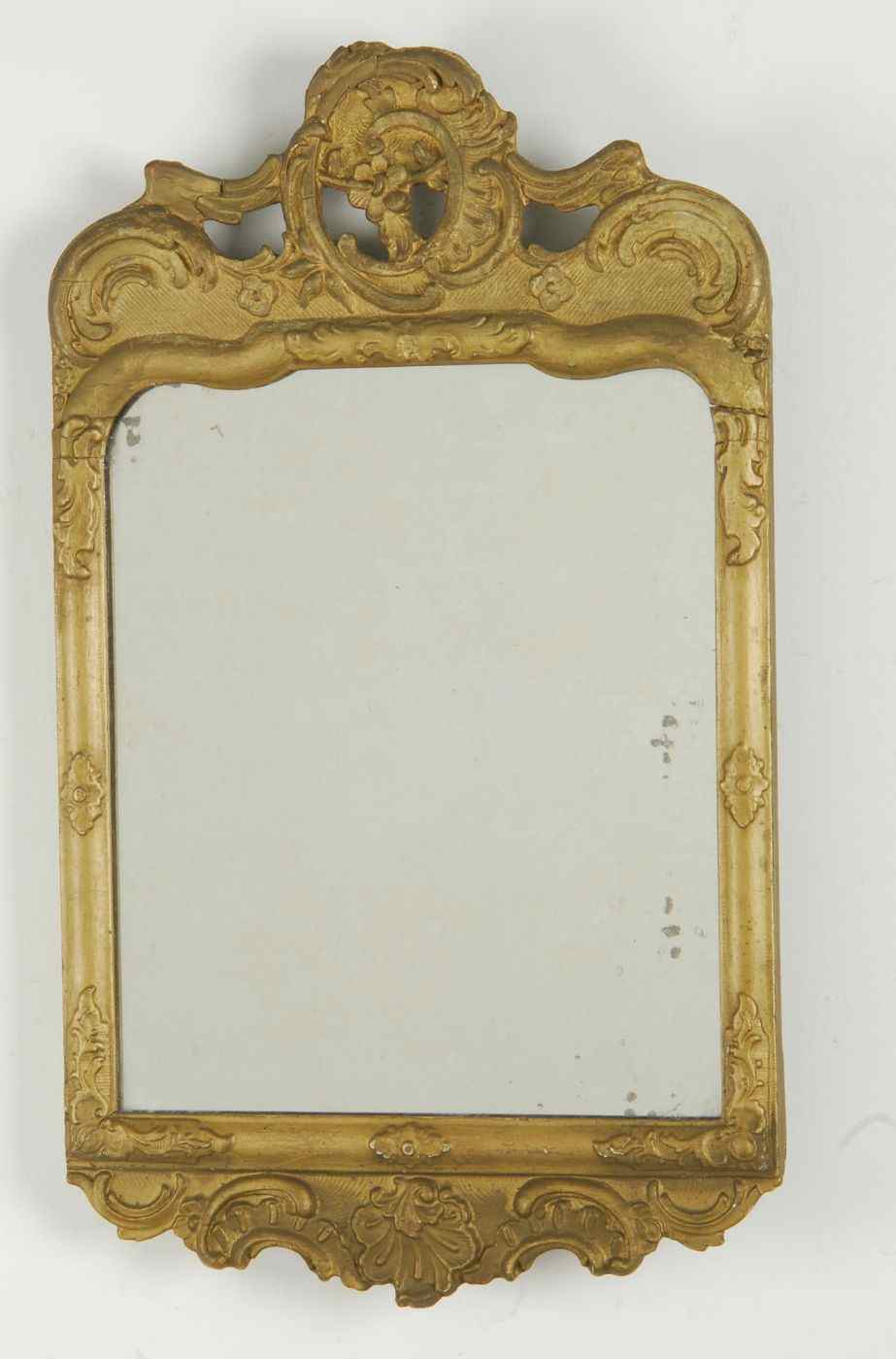 Appraisal: EUROPEAN CARVED WOOD MIRROR th CenturyIn rectangular form Gilt replaced