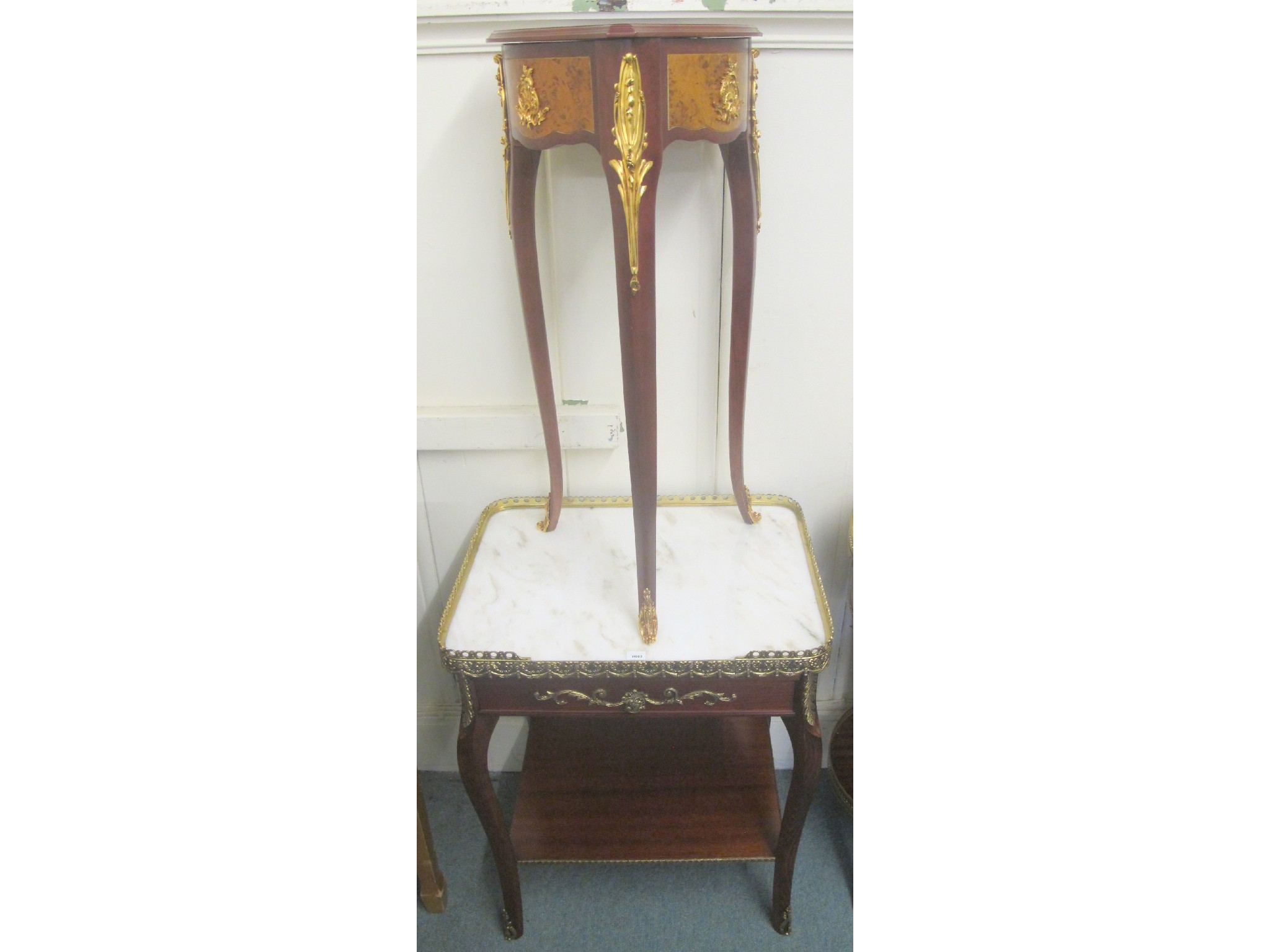 Appraisal: A reproduction marble topped side table and a bijouterie table