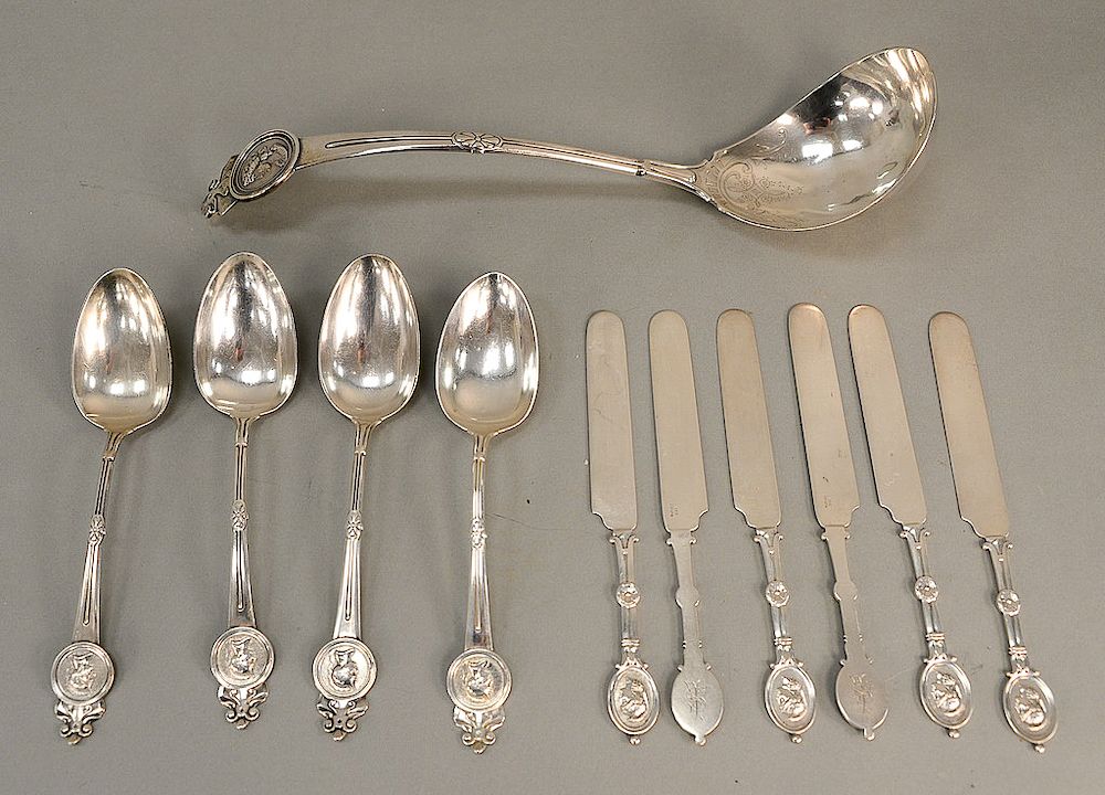 Appraisal: Eleven piece Medallion set with large ladle four serving spoons