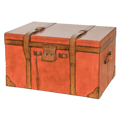 Appraisal: A tan leather covered trunk in Victorian style with leather