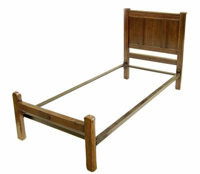 Appraisal: An oak single bedstead in cm h in cm w