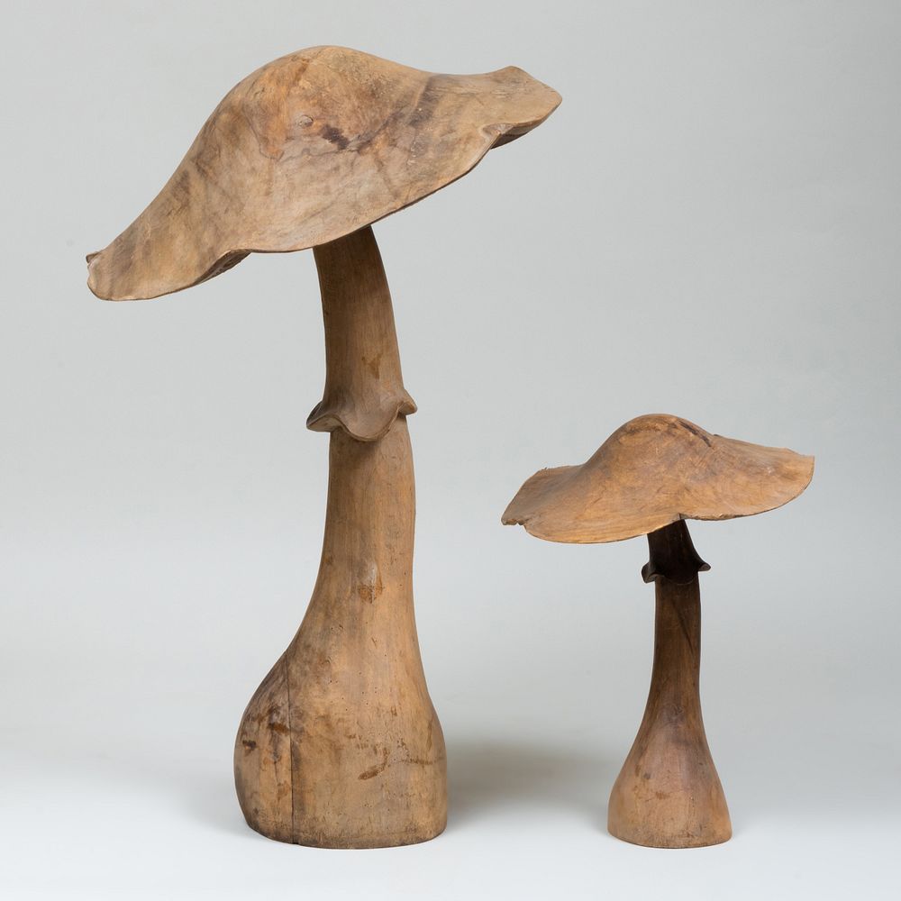 Appraisal: Two Carved Wooden Mushrooms The tallest x in diam Condition