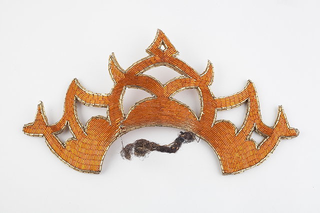 Appraisal: A beaded headdress from the film Flash Gordon worn by